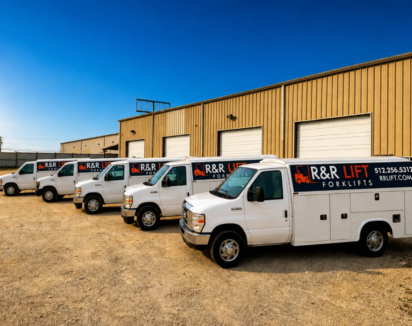 R&R Lift service truck fleet parked outside the Buda shop